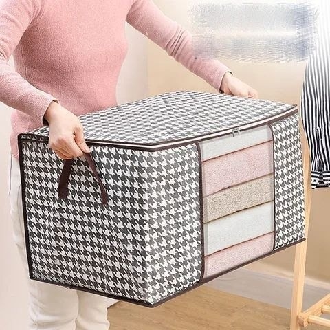 شنطة تخزين ملابس ومفروشات منقوشة بسوستة كبيرة
