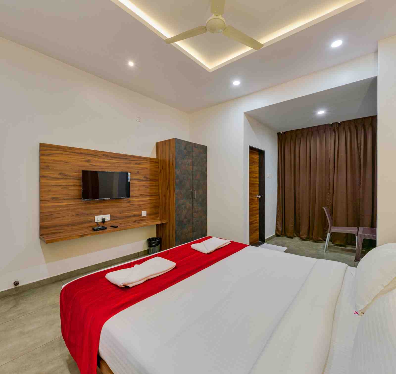 Actual guest room interior at Hotel Trisha Executive in Adamapur, Kolhapur