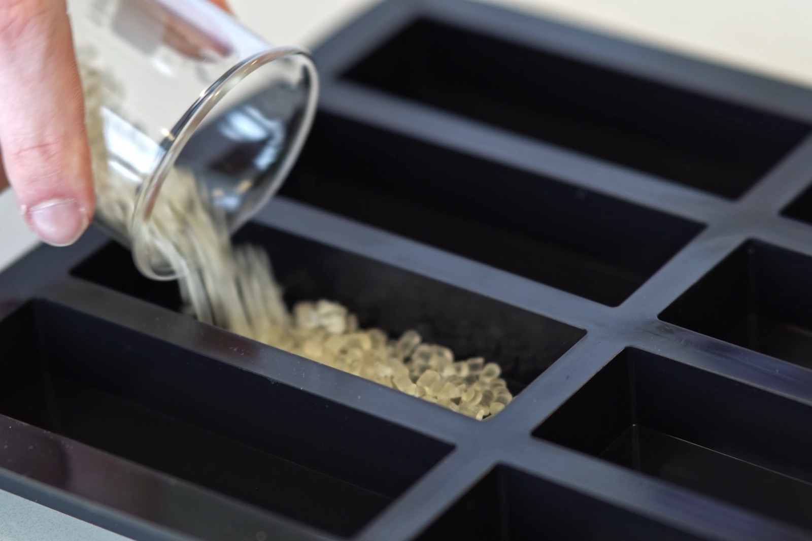 Alaagi resin pellets being poured into a mould