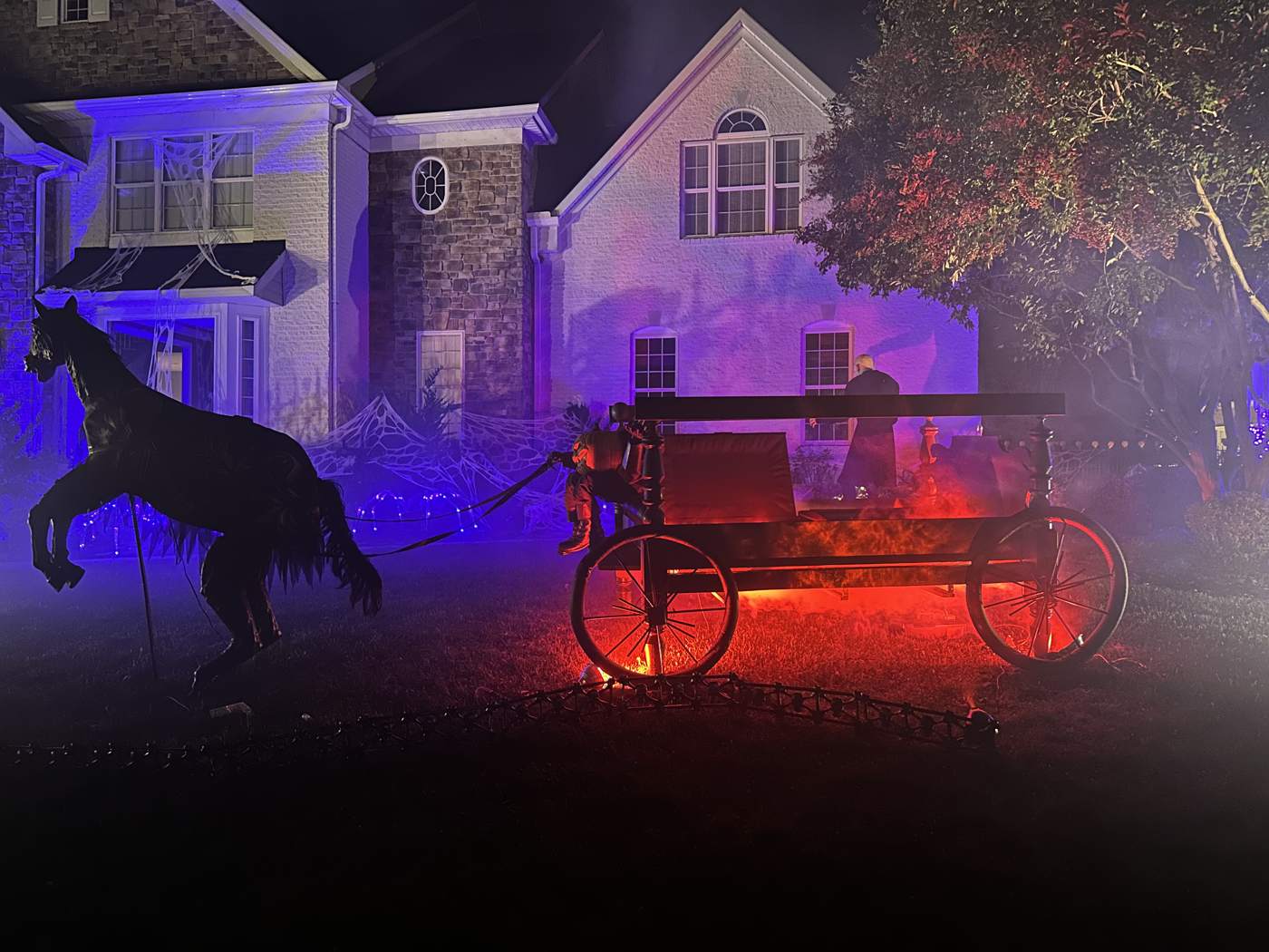 Night scene of the hearse and house