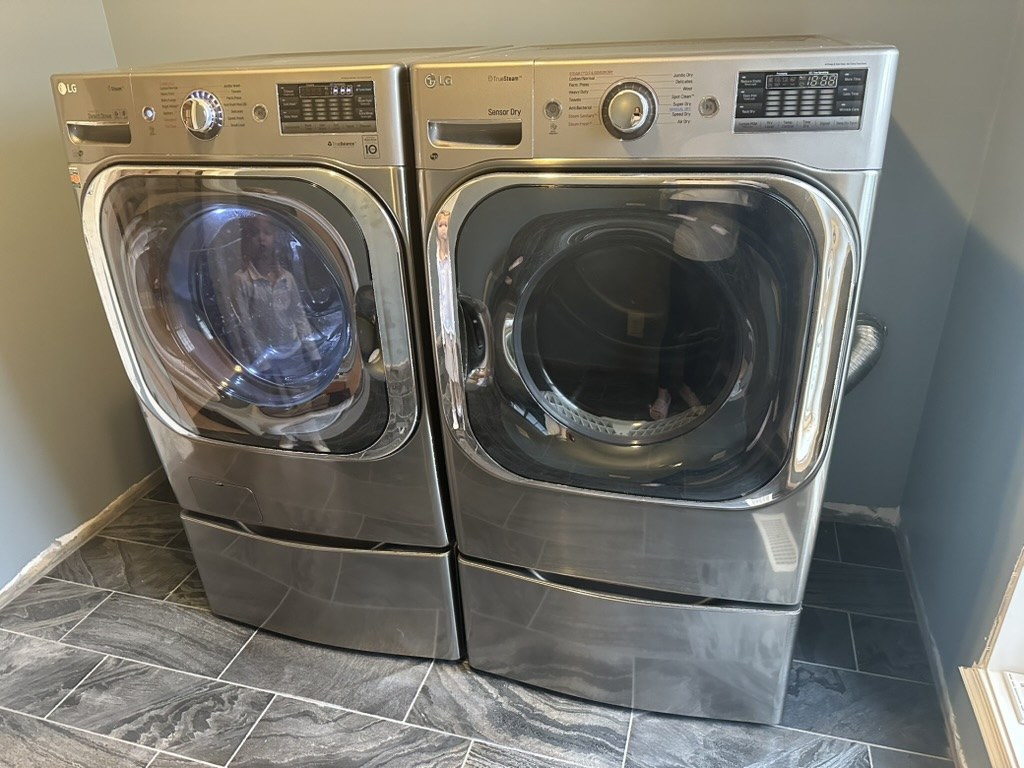Washer and dryer on the new laundry-room floor