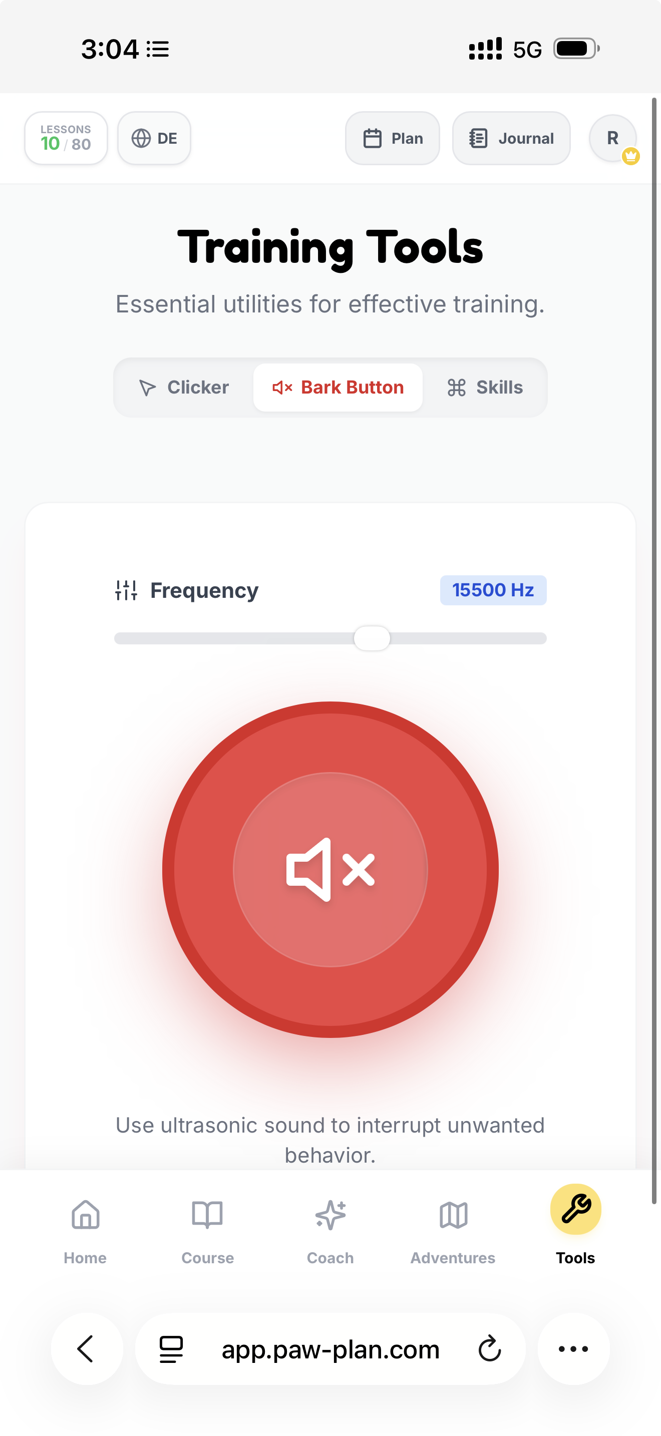 Bark Button tool inside the PawPlan app showing frequency slider and large red trigger button