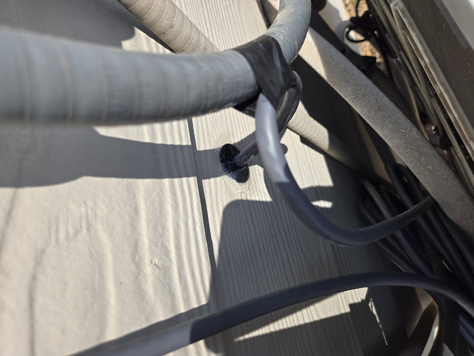 Weatherproof exterior cable penetration