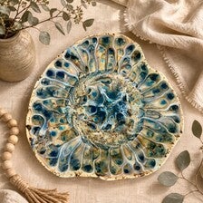 Hand-built platter with a hand-painted peacock design.