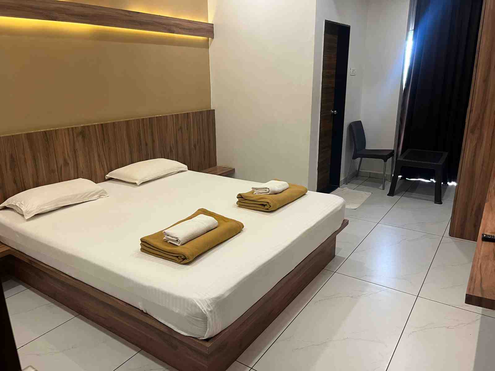 Actual guest room interior at Hotel Trisha Executive near Shri Sant Balumama Temple, Adamapur, Kolhapur