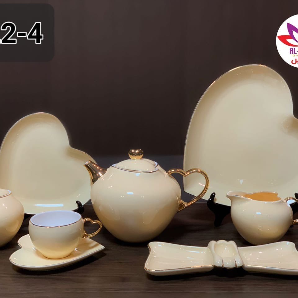 طقم شاي وجاتوه بورسلين حراري فاخر 25 قطعة تصميم قلب بحواف مذهبة
