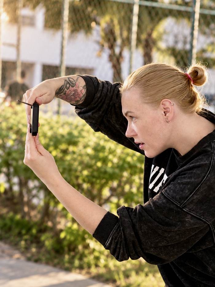 Masha Rudnik filming content outdoors
