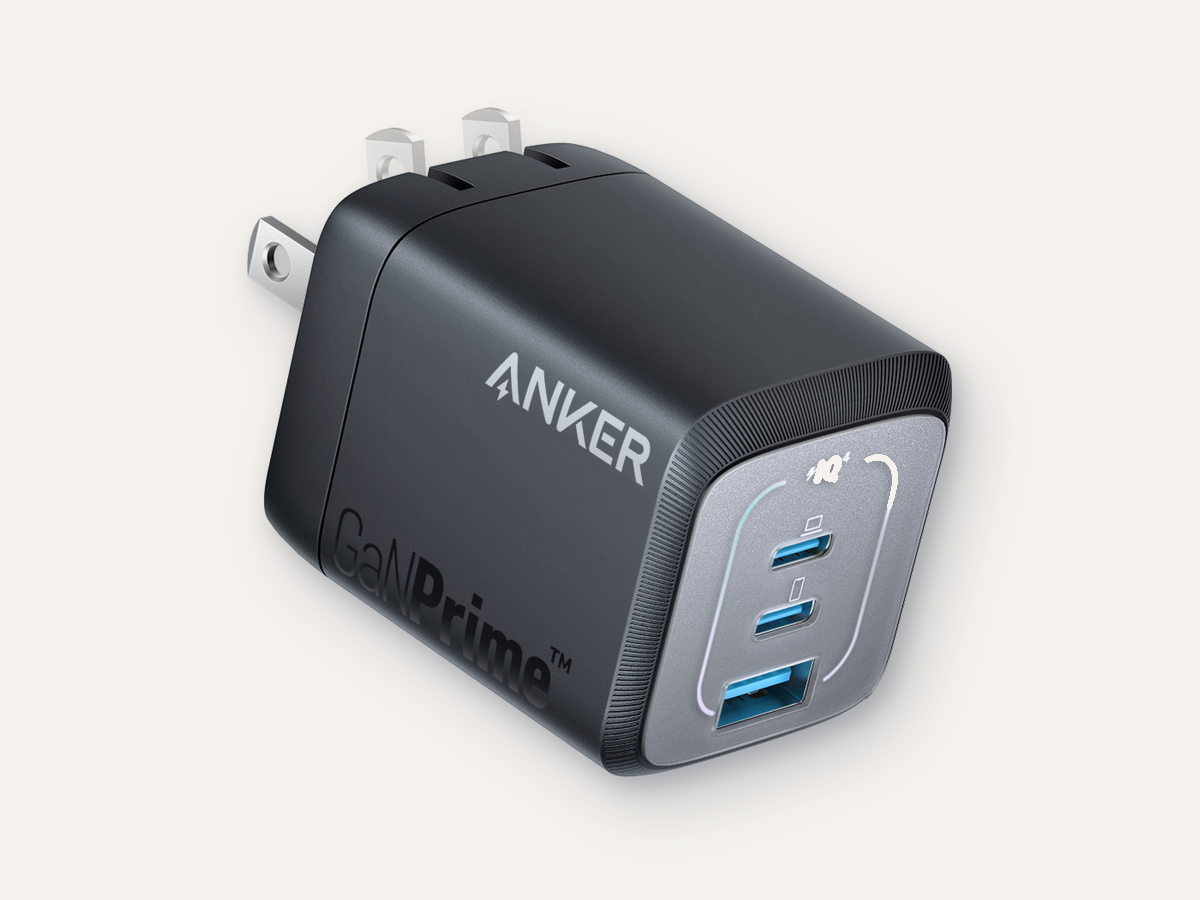 Anker Prime 67W GaN Wall Charger product image on warm off-white background