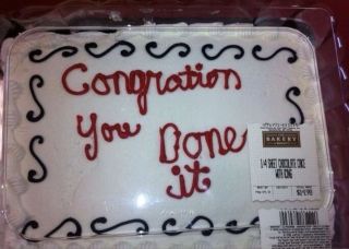 a picture of a cake with "congration you done it" written in icing