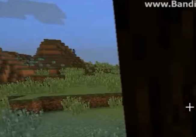 Herobrine in the distance standing on a hill