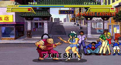 Screenshot of Burning Rival after Asuka has just finished Mr Chin with a jab. The word "FINISH!!" appears near the bottom of the screen