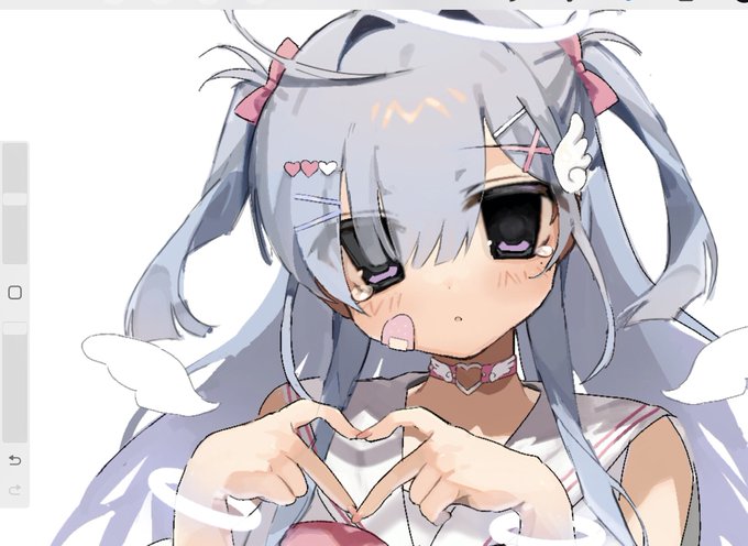 Lovely angel girl forming a heart with her pointer fingers