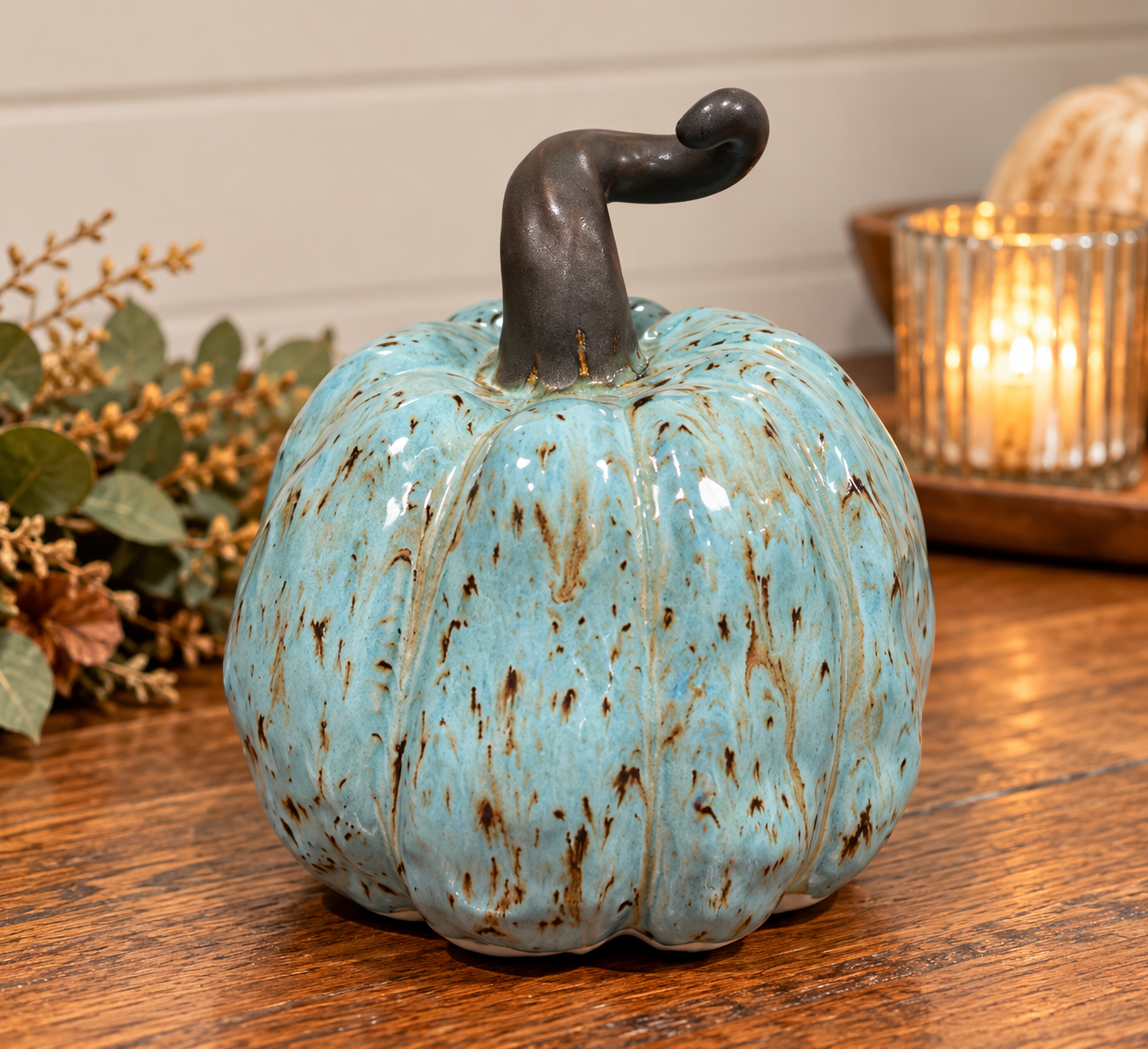 Hand-built pumpkin with hand-painted details.
