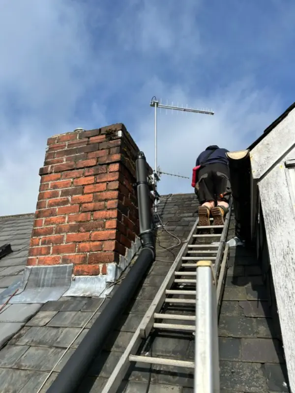 Rural property with CCTV cameras mounted on outbuildings and barns