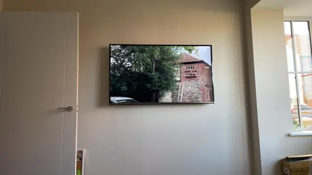Security camera cabling and Ethernet cables running through a loft space during installation