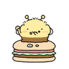 A bee on top of a hamburger, eating it