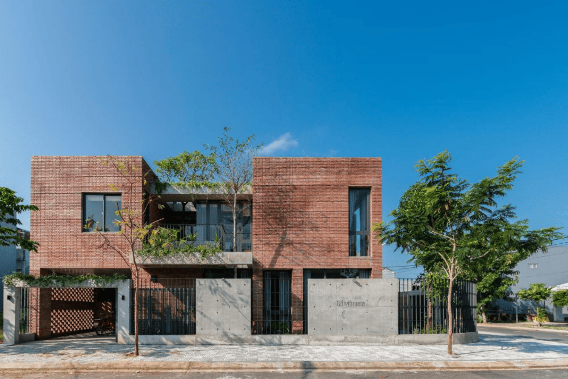 Best premium natural building materials in Bengaluru — signature clay brick elevation by THELEVATION