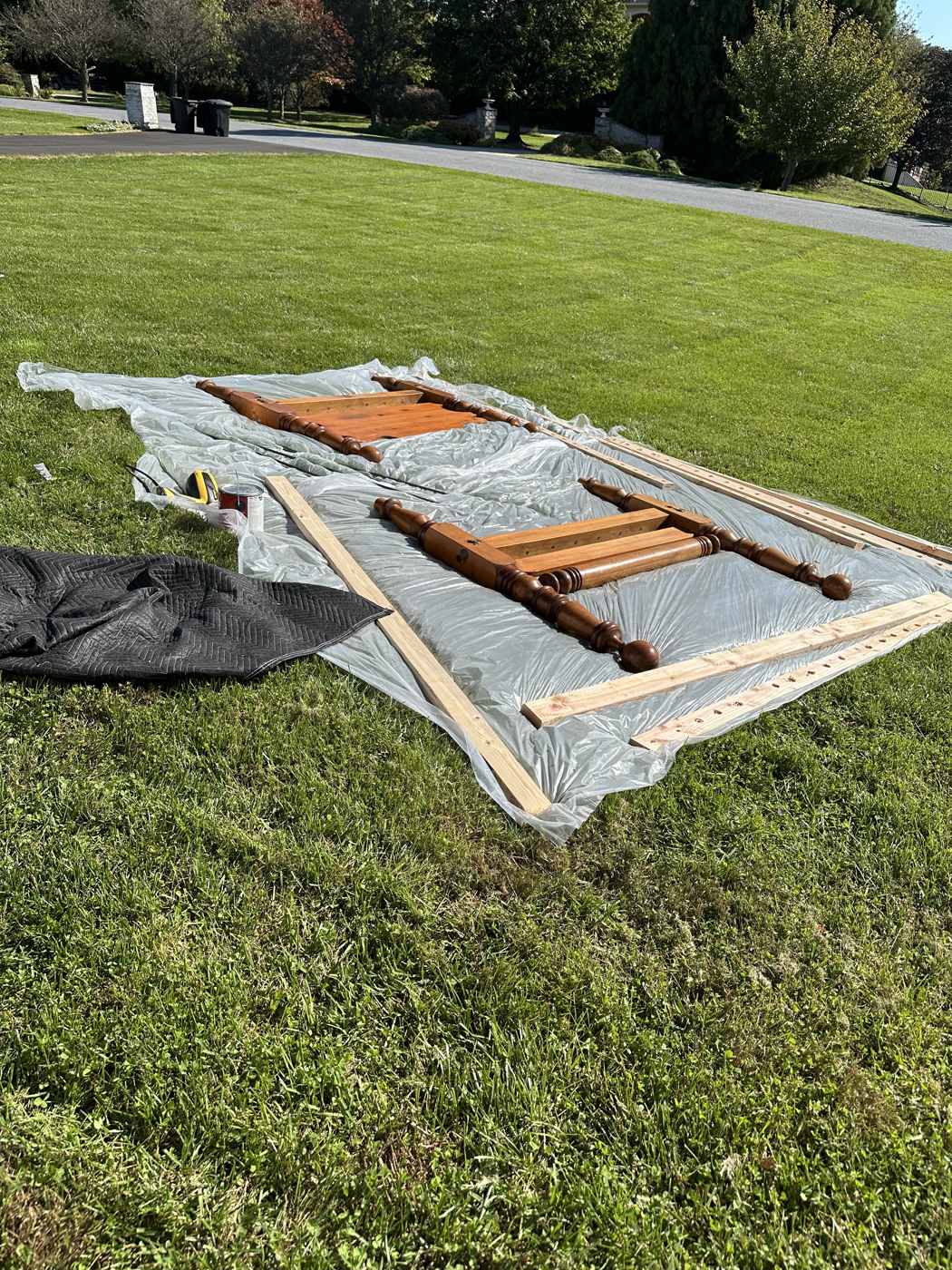 Taking the bed apart on the lawn