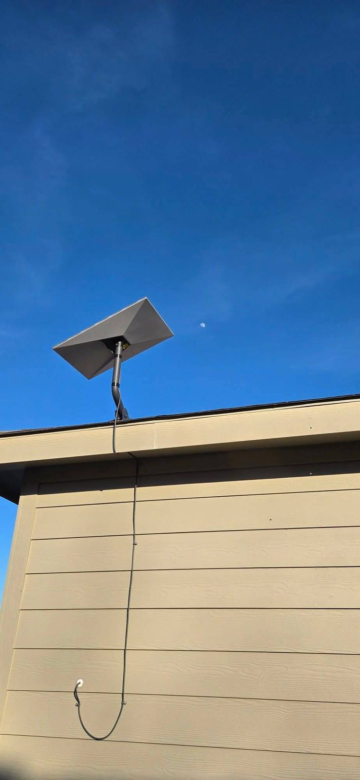 Eave-mounted Starlink dish