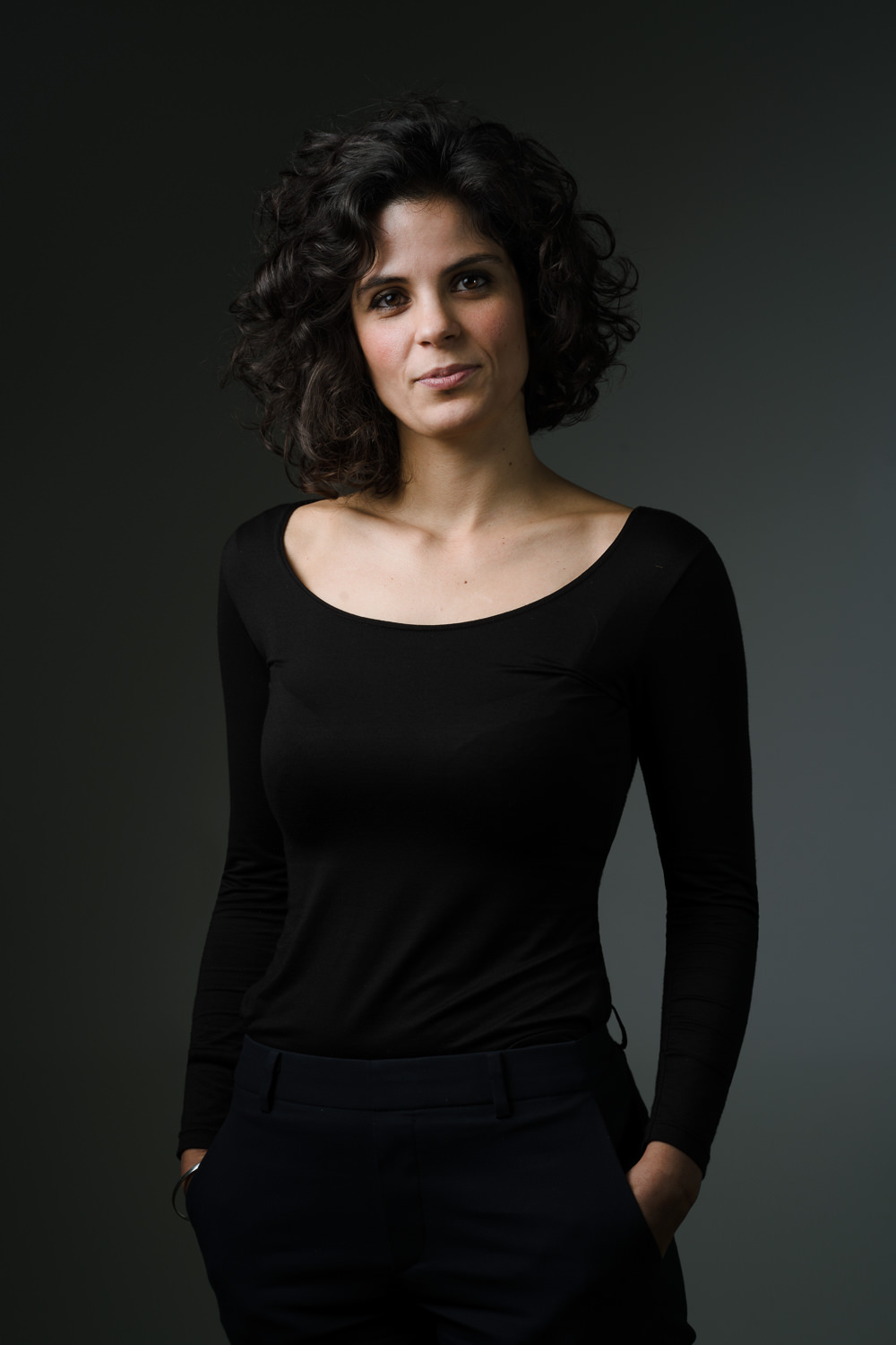 Studio portrait, dark background