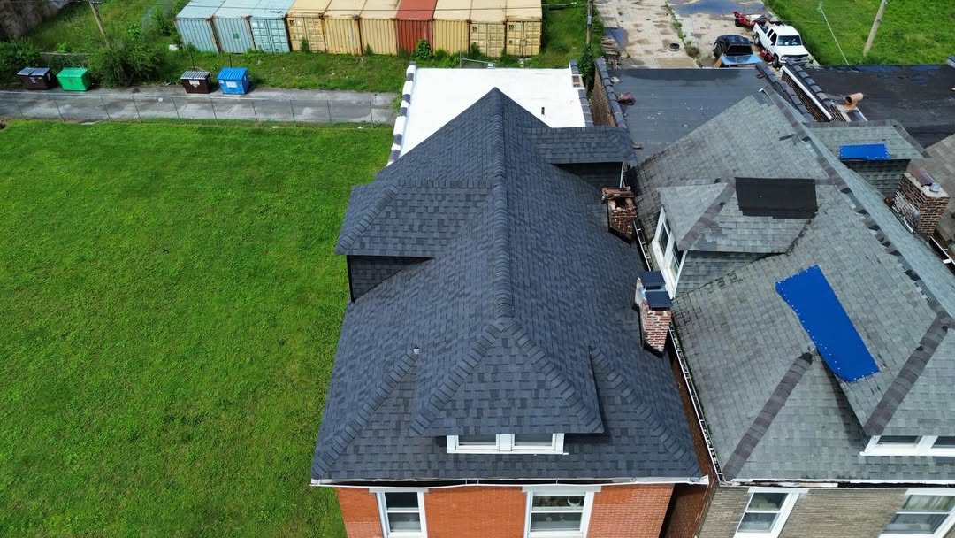 Aerial view of residential shingle roof replacement