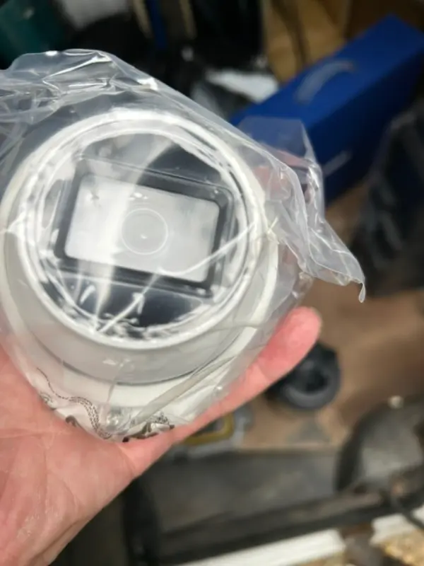 4K ultra HD security camera with clear daytime image quality showing a residential street
