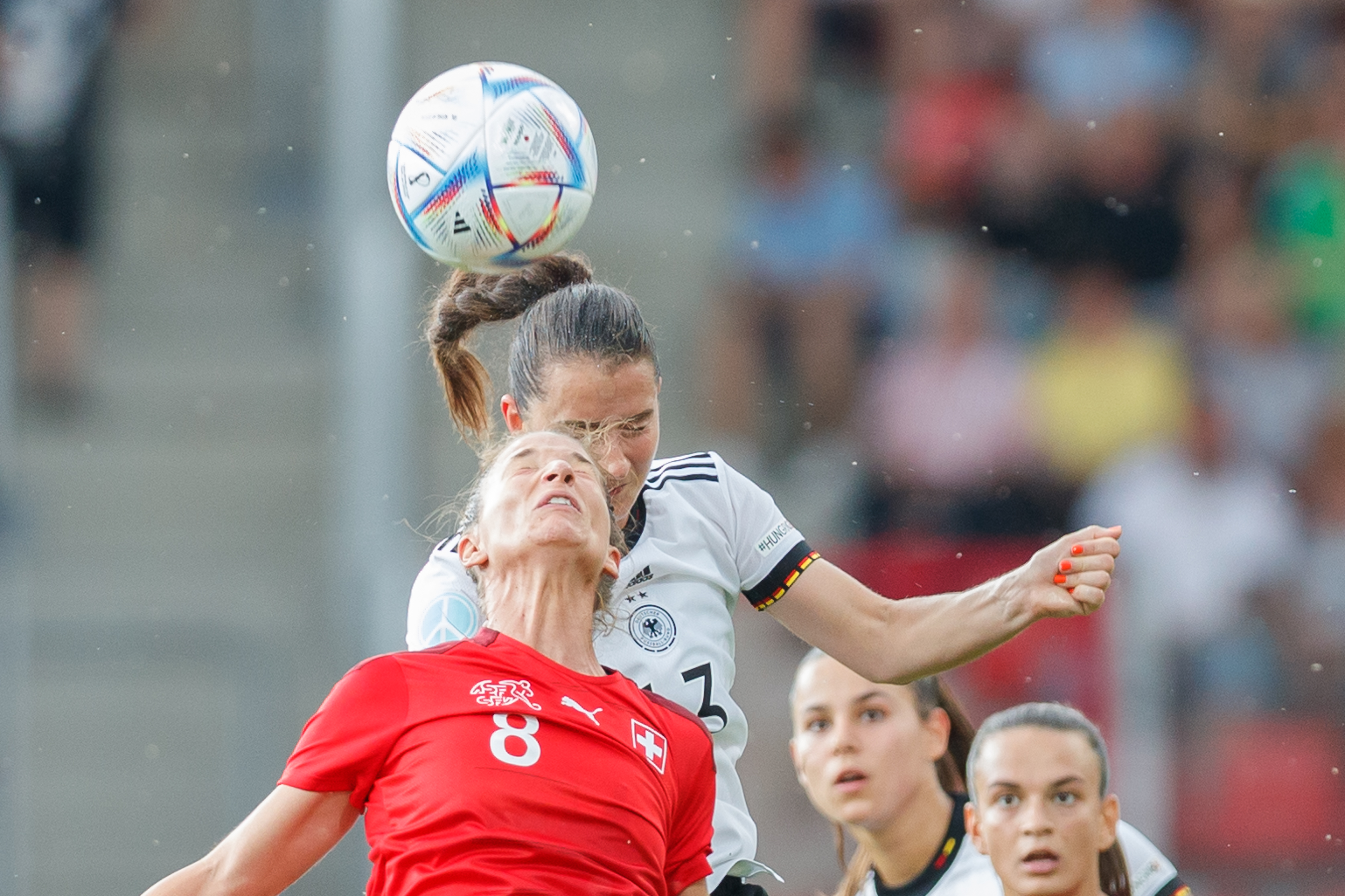 Two soccer players heads colliding going for the same ball — HBOT concussion recovery at Polaris Collective Wellness Portland