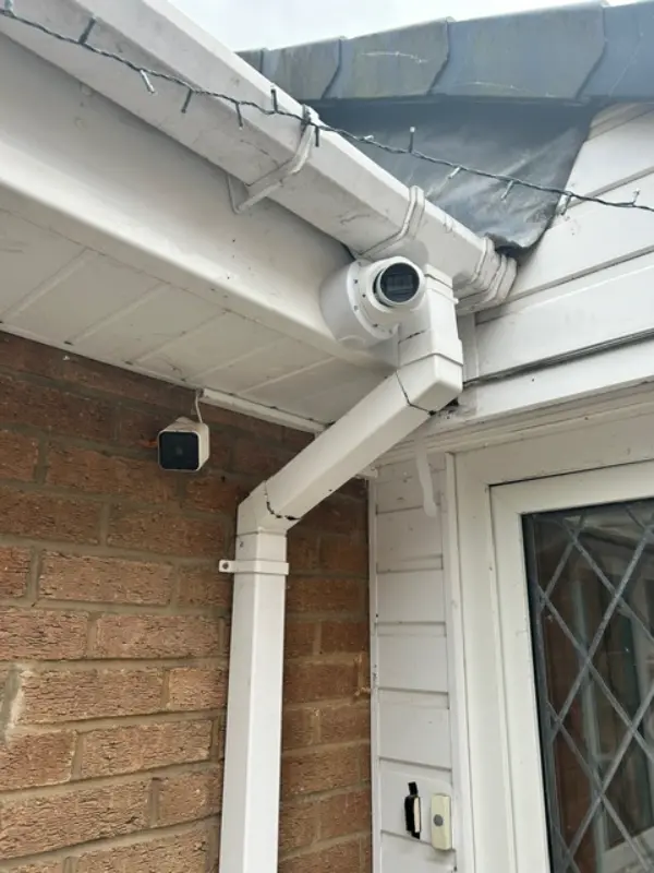 Mobile app interface showing live remote viewing of multiple security camera feeds