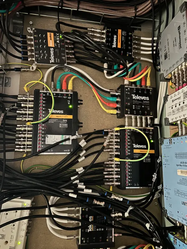 RJ45 Ethernet connector being crimped onto Cat6 cable for CCTV installation