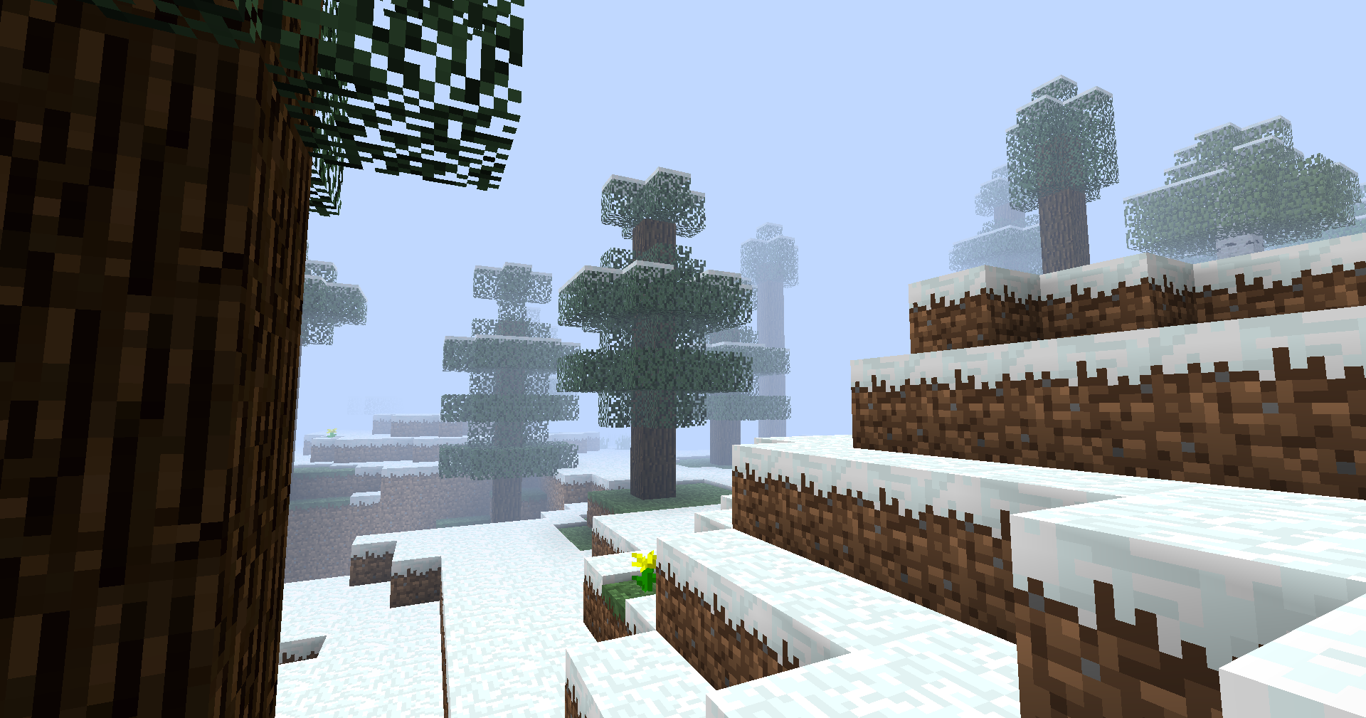 Screenshot of a snowy spruce forest in Minecraft, with fog surrounding the trees.