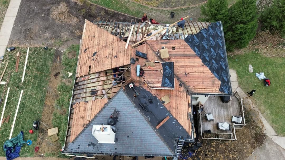 Aerial view of roof replacement in progress