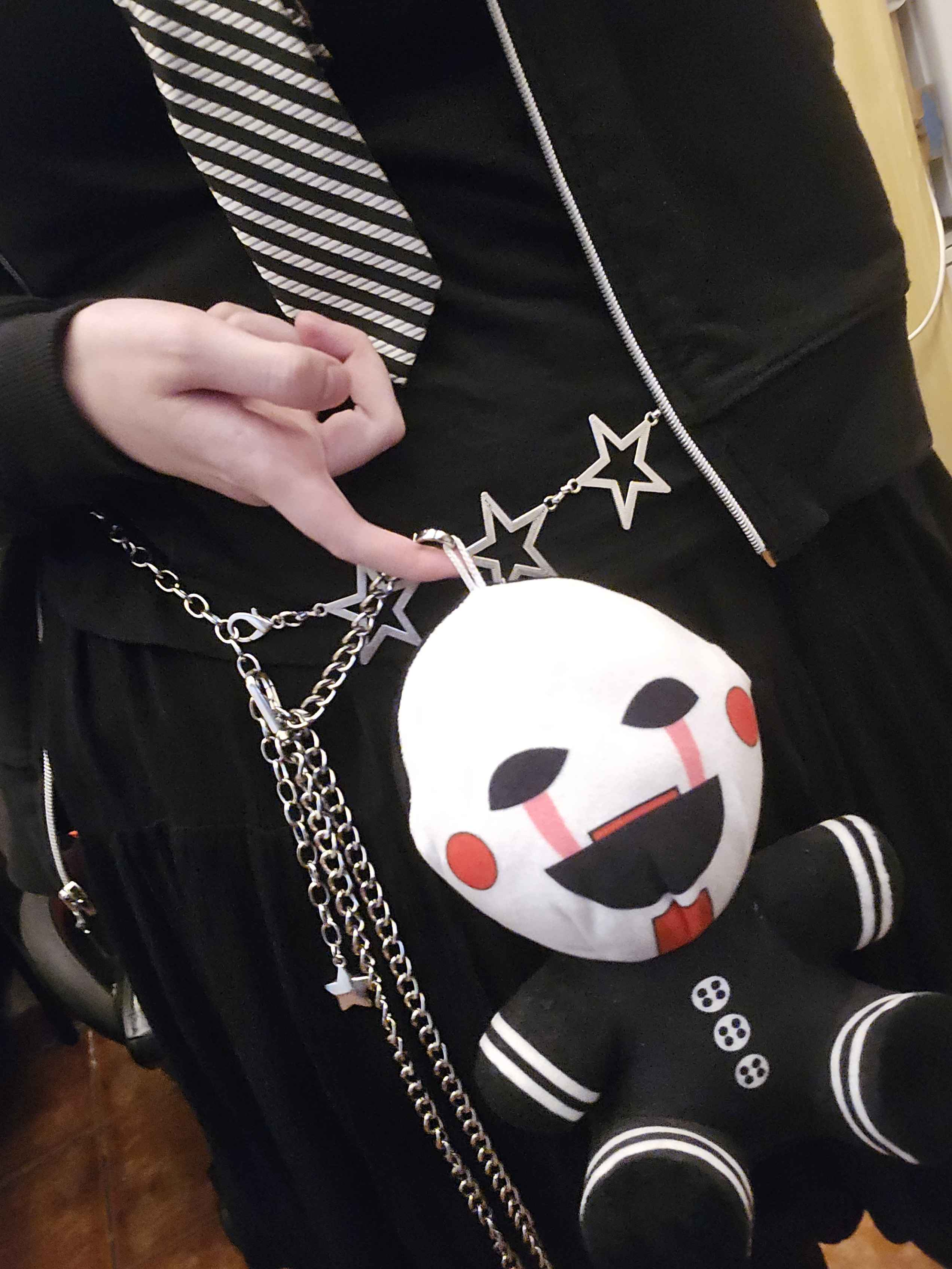 Puppet plush chained