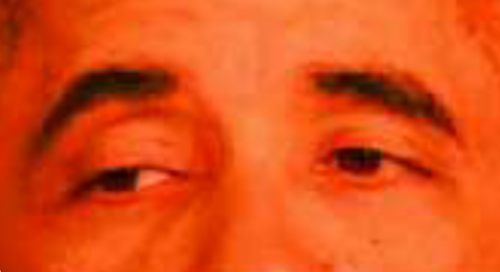 close up of barack obama's eyes, red tint. from then perish.