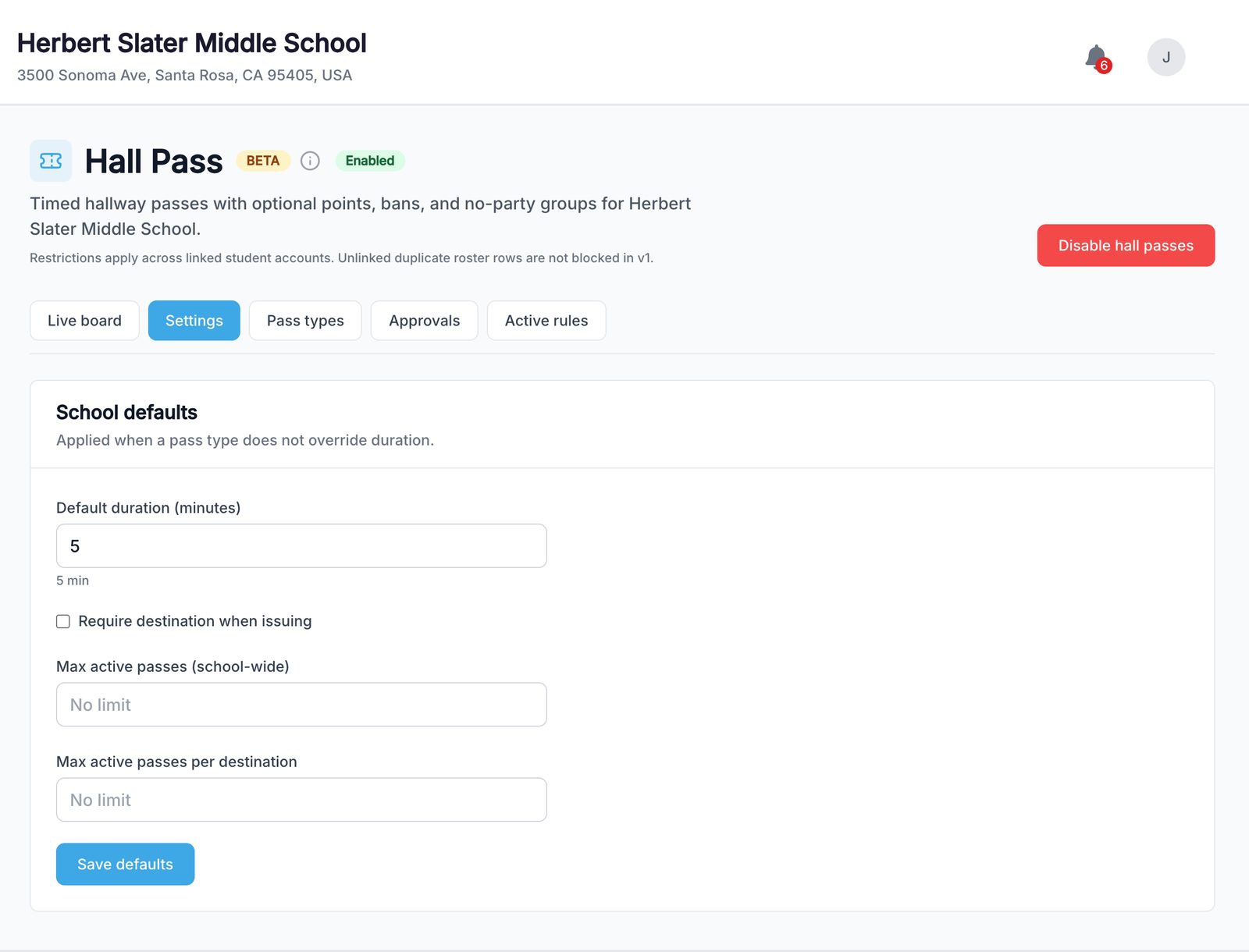 School defaults for duration, destination requirement, and max active passes.