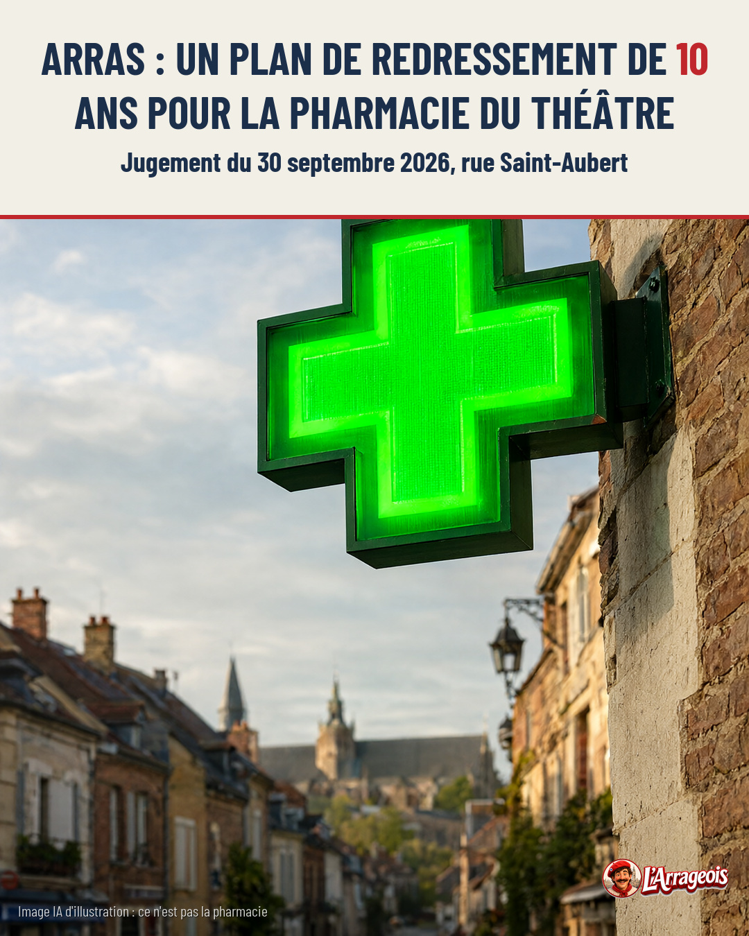 Croix verte lumineuse de pharmacie fixée à un mur de pierre, avec un paysage urbain flou en arrière-plan.