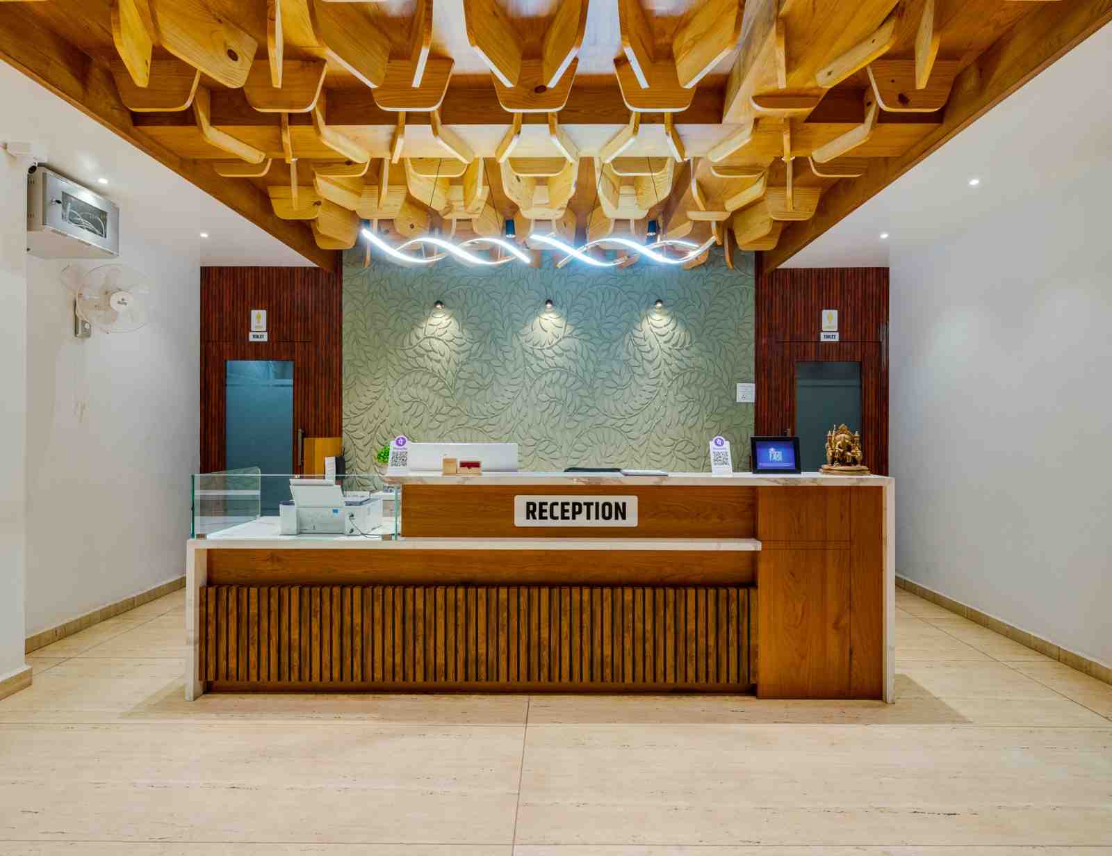 Actual reception counter at Hotel Trisha Executive in Adamapur, Kolhapur