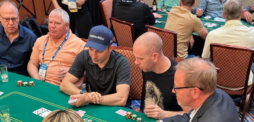 Corporate poker training session led by a professional poker player