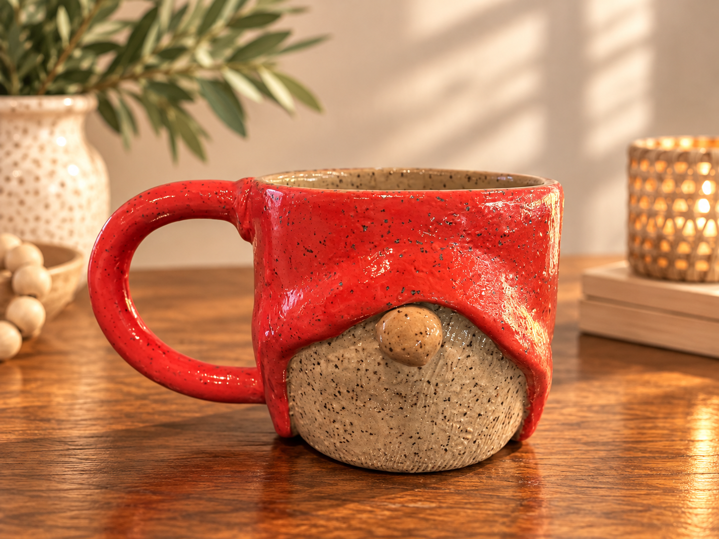Hand-built mug with a hand-painted gnome design.