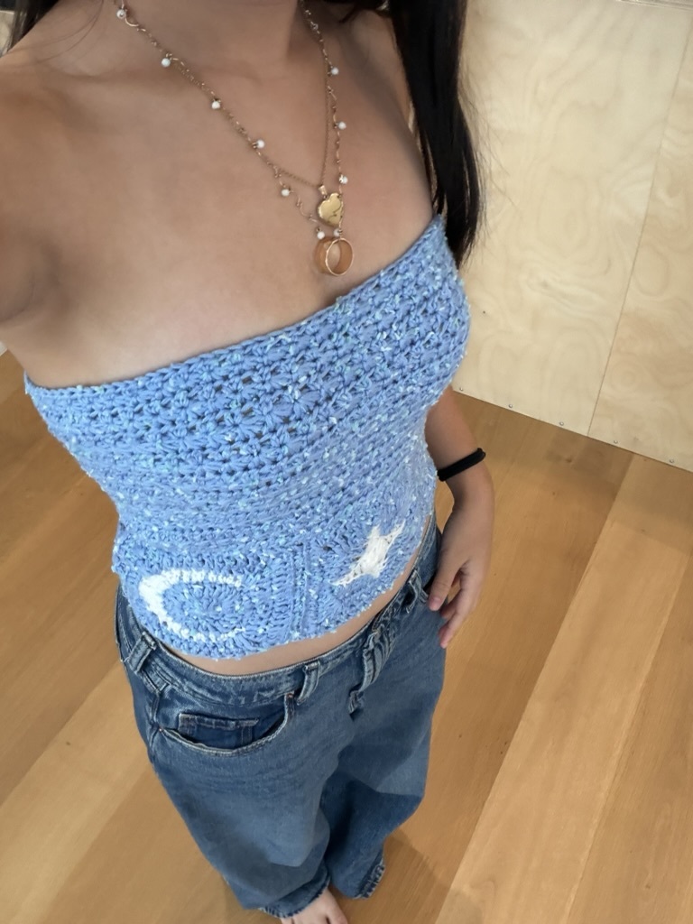 blue crochet tube top with star and moon details on bottom