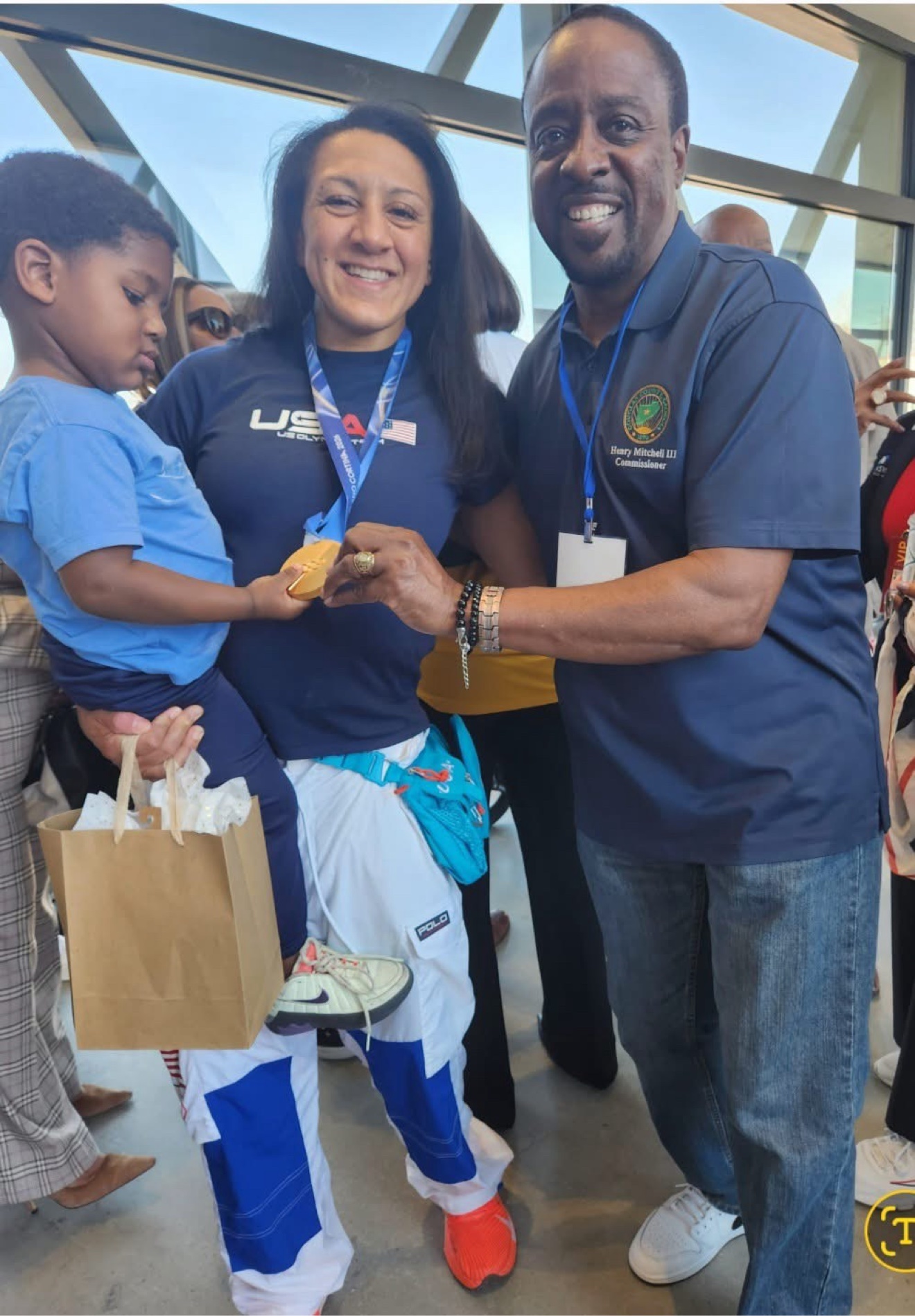 Commissioner Mitchell honoring a Team USA Olympian