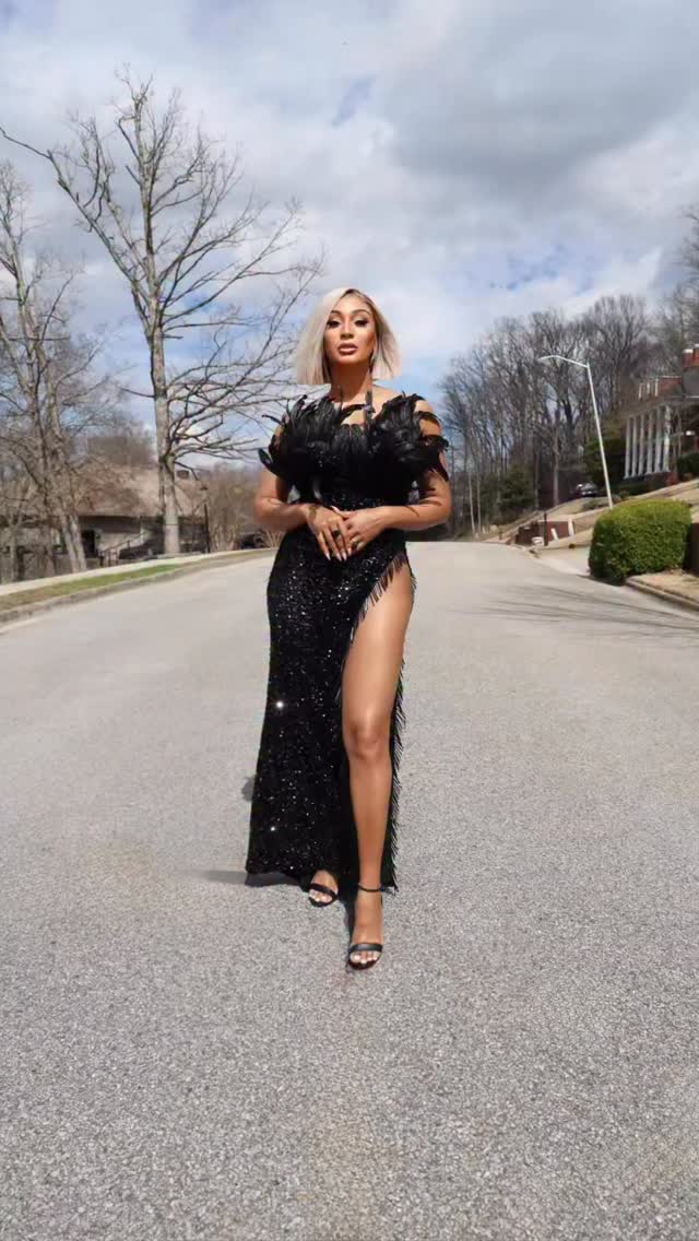 Melody Shari — Founder of Seventh Avenue Beauty, in black feathered dress