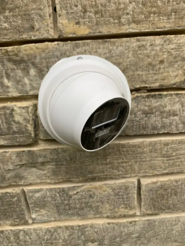 Security camera cabling and Ethernet cables running through a loft space during installation