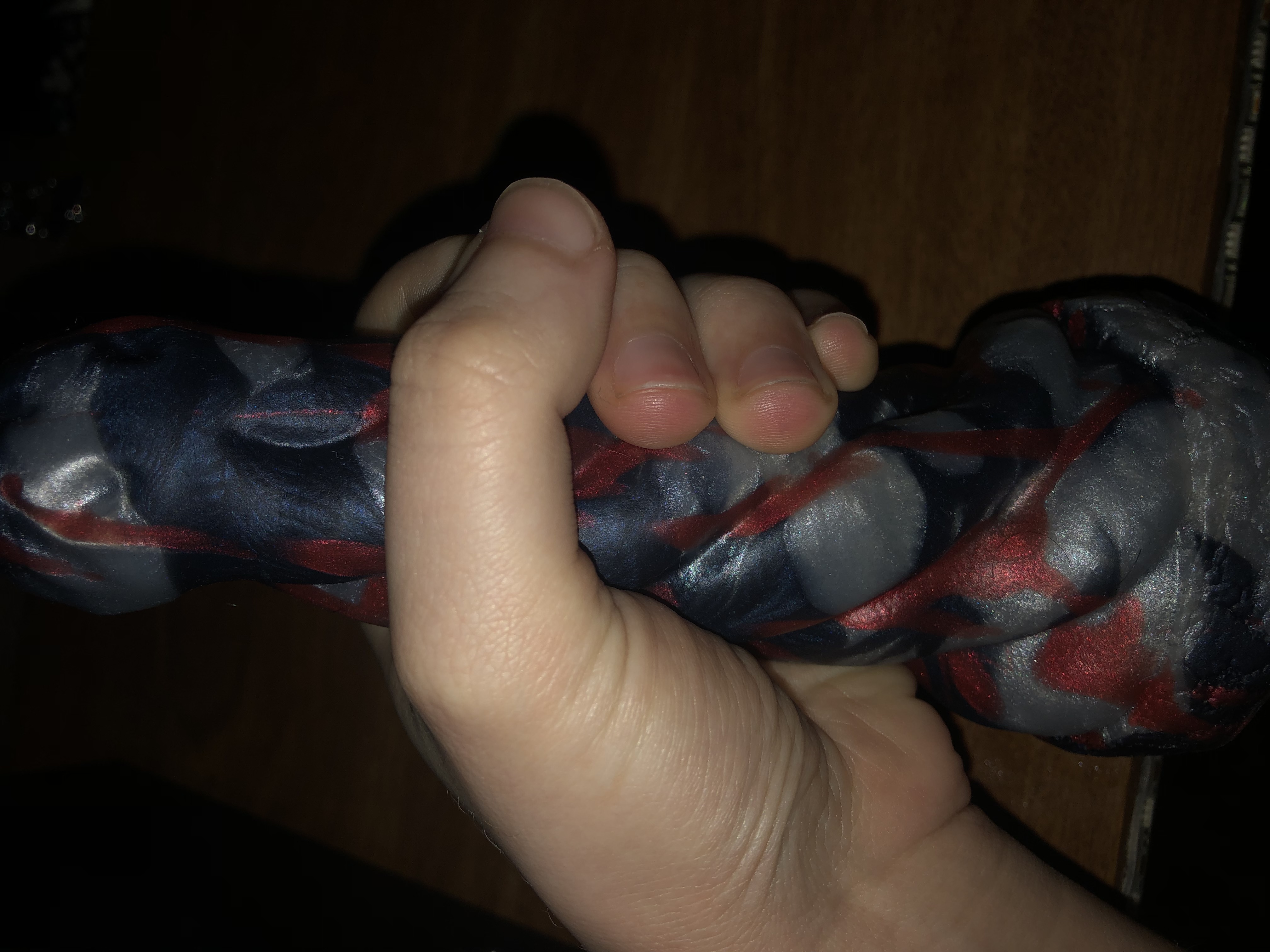 a side view of the mind flayer squeezed in my hand to show scale