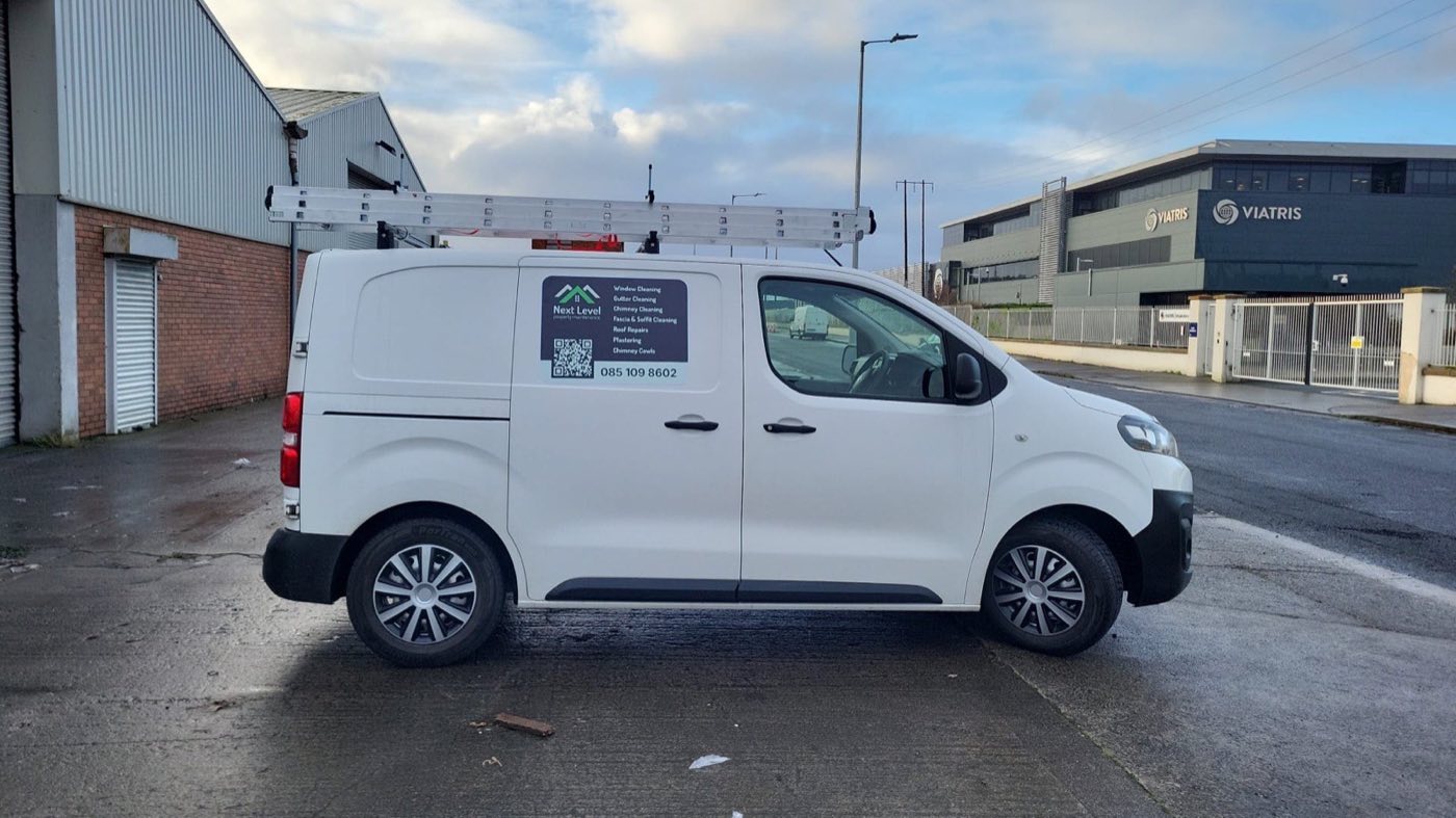 Next Level Property Maintenance branded van, on the job