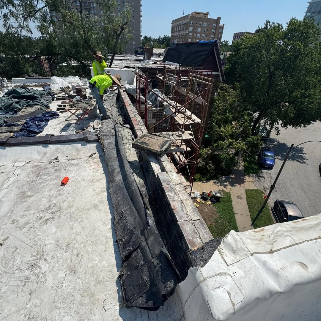 Roof work in progress on multifamily building