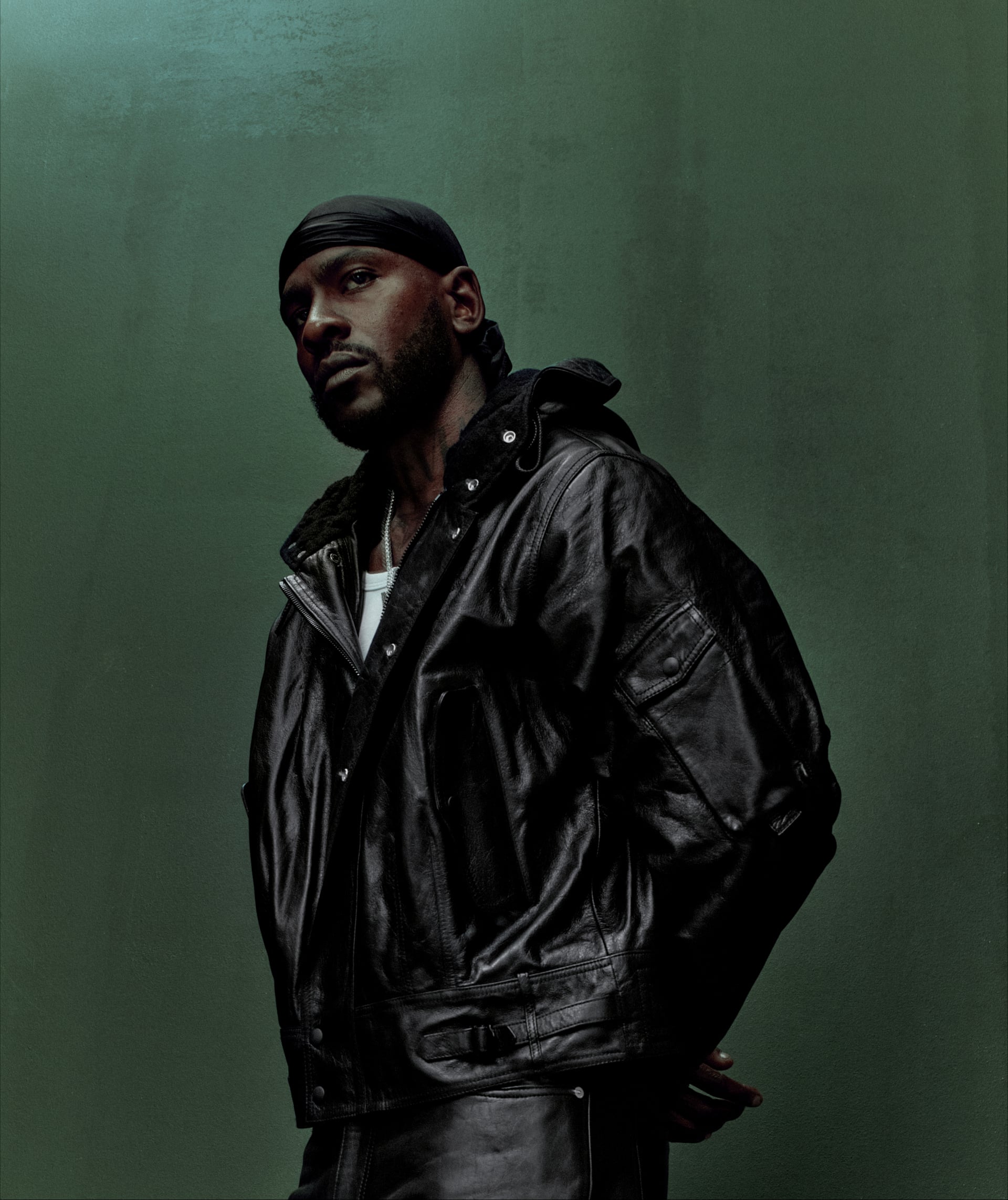 Skepta showing his two-tone neck tattoo, photographed by Jordan Hemingway for The Guardian
