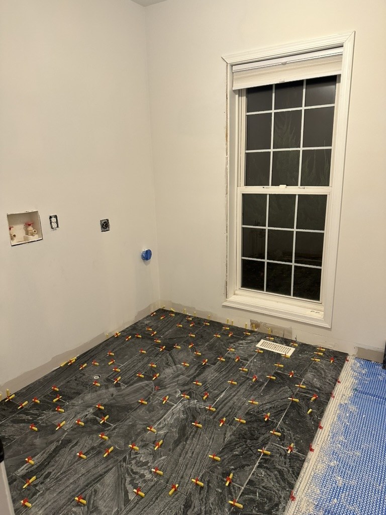 Tile going down over the membrane