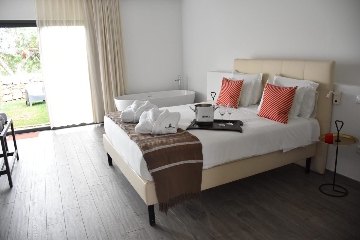 Double Room with Garden — bedroom with garden access and freestanding bath