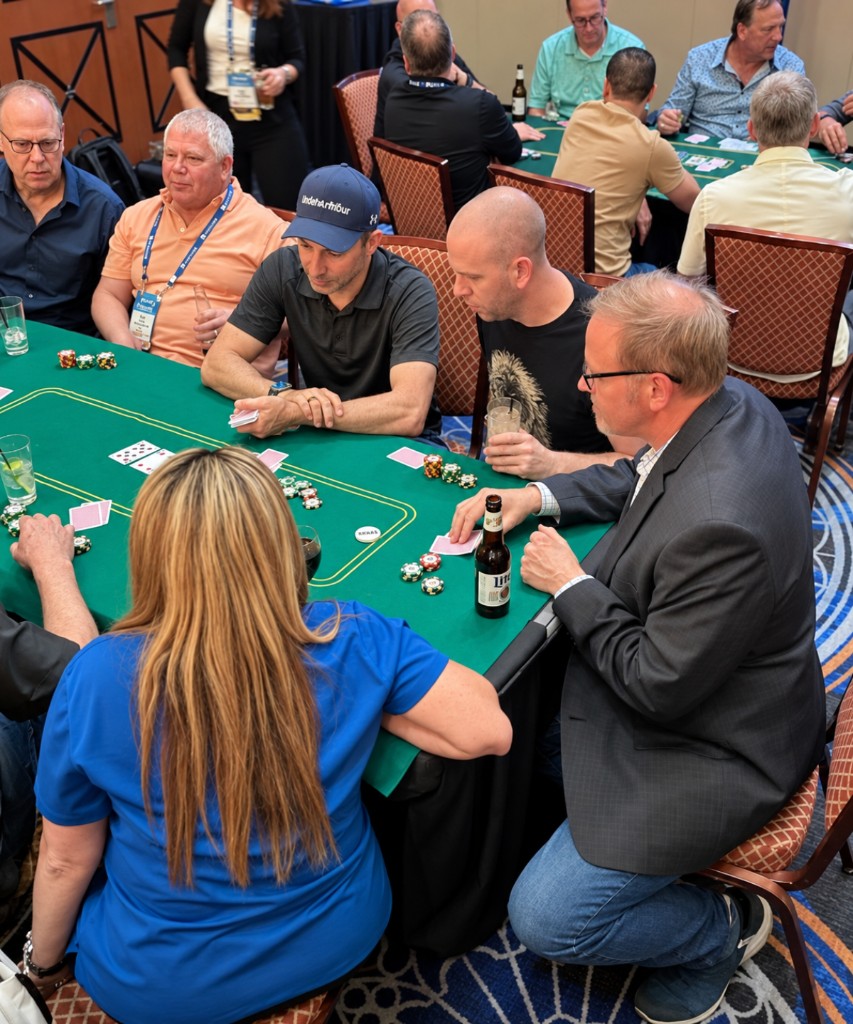 Poker cards and chips on a table during live hand analysis