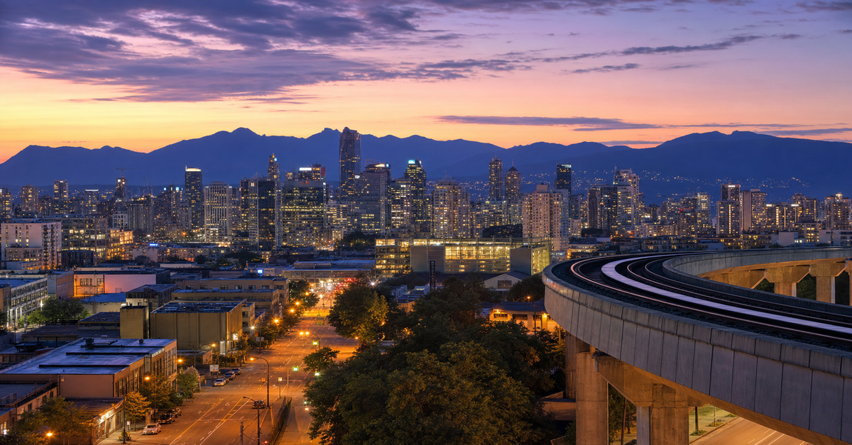 Vancouver's SkyTrain network at twilight — the Surrey-Langley extension is funded by the Canada Public Transit Fund portion of the Carney-Eby deal